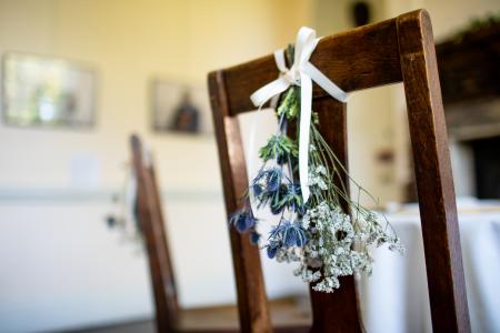 Chair with floral wedding decoration