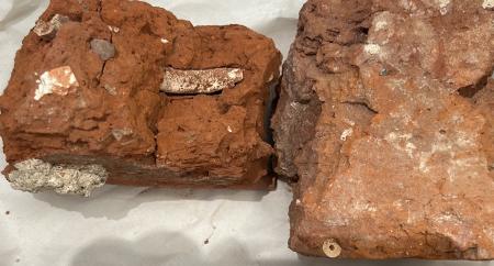 clay pipes embedded in clay bricks from 17th century