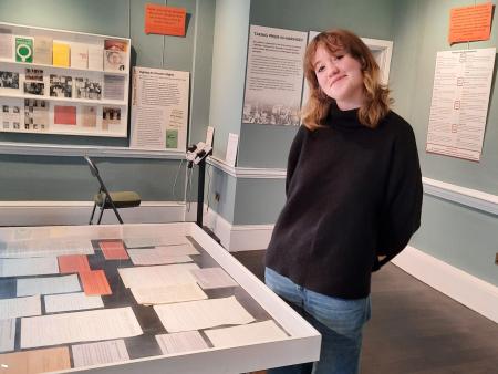 person in museum gallery