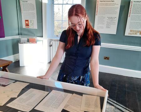 person in museum gallery