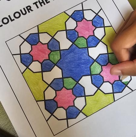Image showing someone colouring geometric patterns