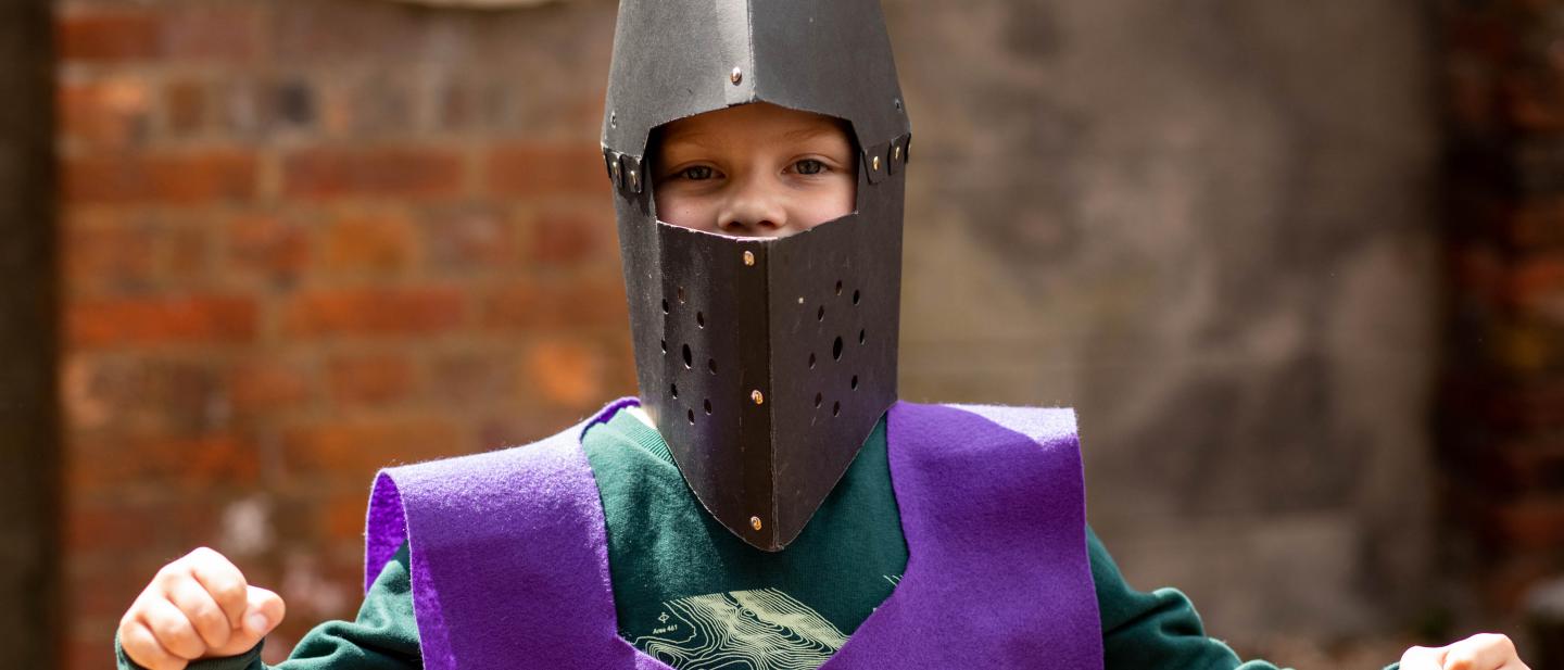 Photo of a child dressed up as a knight