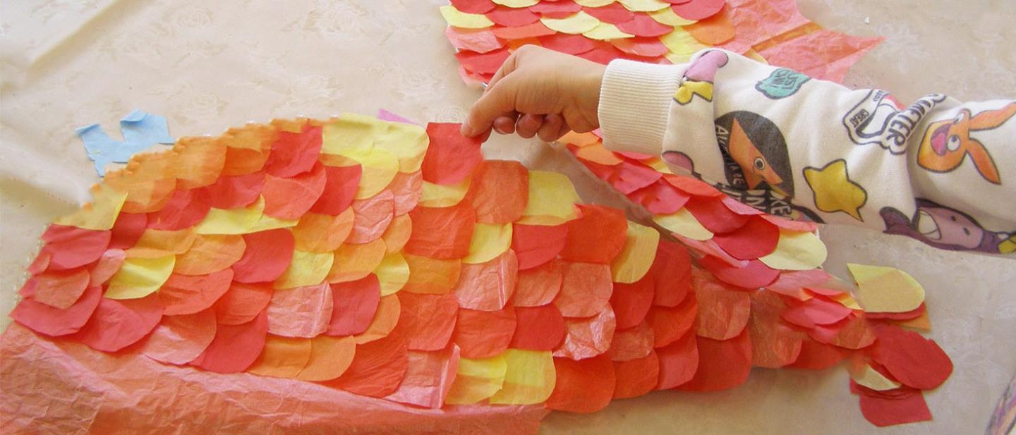 Picture of child making colourful wings