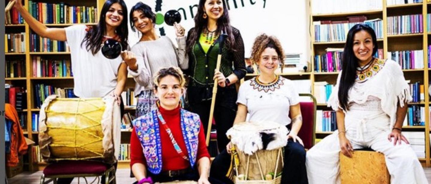 6 women performing Afro-latin music