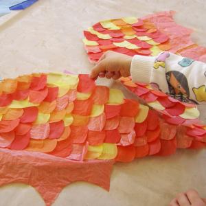 Picture of child making colourful wings