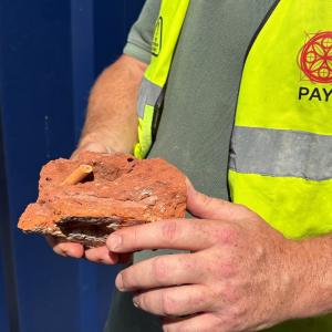 16th century brick with clay pipe 